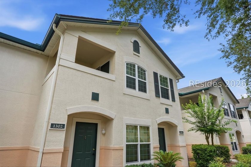 Extensively renovated in 2023, this second-floor end unit offers - photo 3