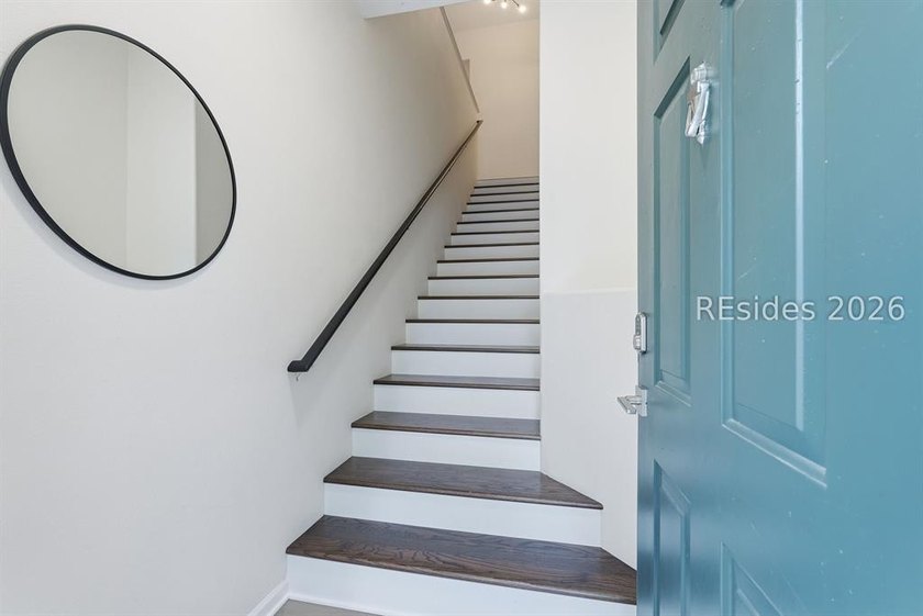 Extensively renovated in 2023, this second-floor end unit offers - photo 5