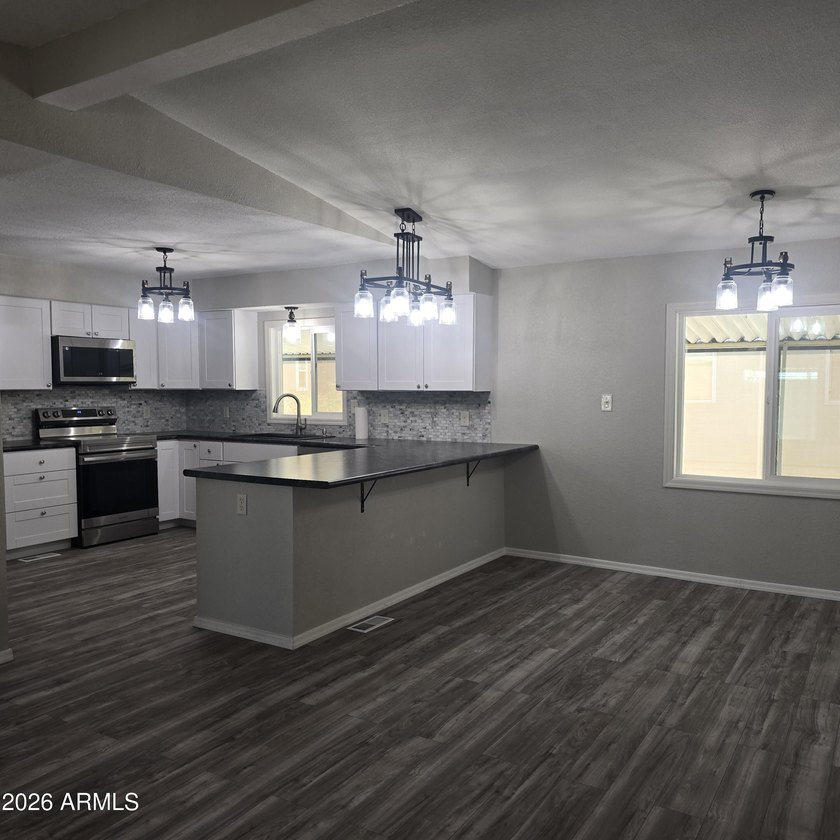 ON LEASED LAND: This home is absolutely gorgeous!! It has been - photo 14