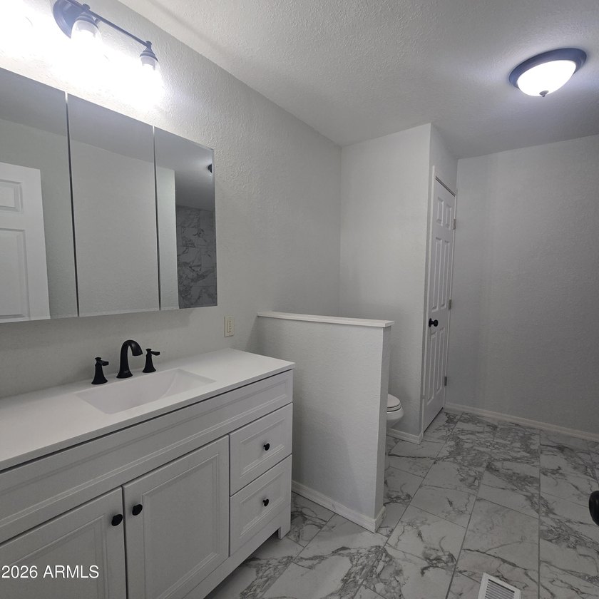 ON LEASED LAND: This home is absolutely gorgeous!! It has been - photo 32