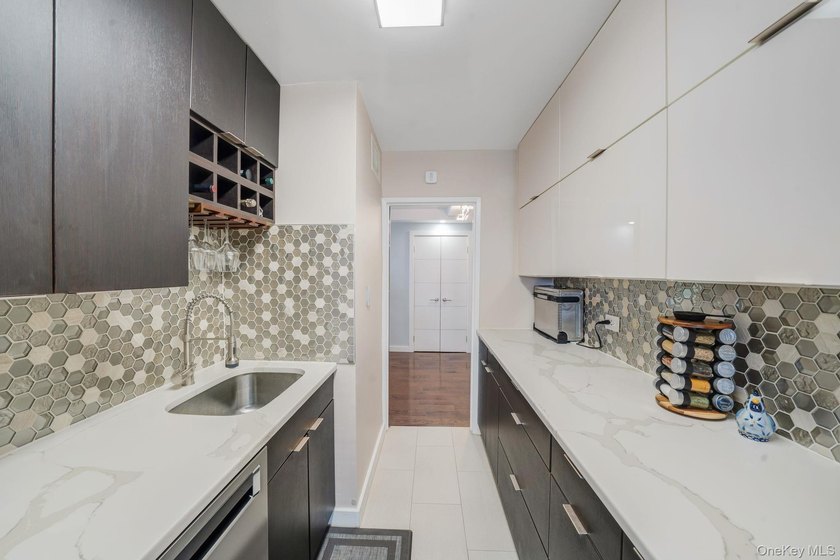 Experience elevated living in this beautiful 2 bedroom corner - photo 8