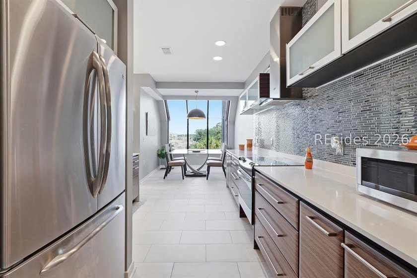 Perched with sweeping views over the exclusive Shelter Cove - photo 2