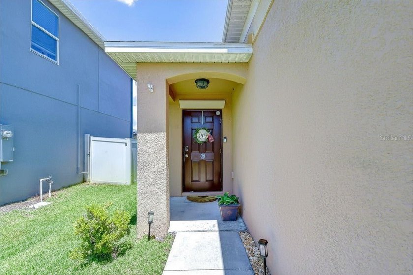 Welcome to this beautifully designed 4-bedroom, 2-bathroom split - photo 2