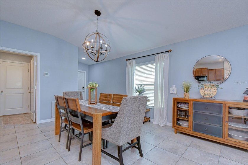 Welcome to this beautifully designed 4-bedroom, 2-bathroom split - photo 4