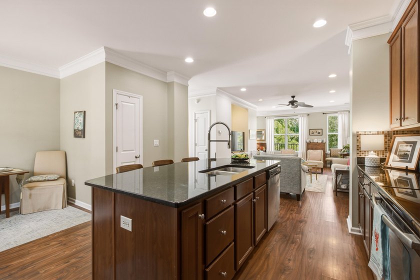 Welcome to this sophisticated and coveted end-unit townhome in - photo 12