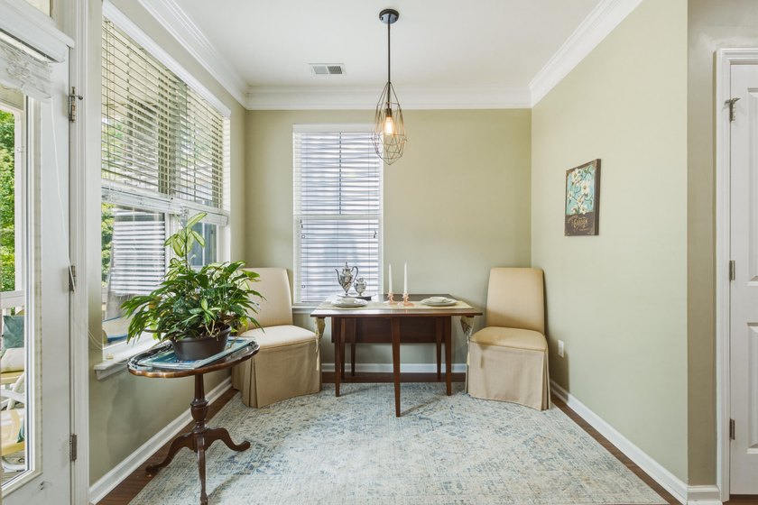 Welcome to this sophisticated and coveted end-unit townhome in - photo 13