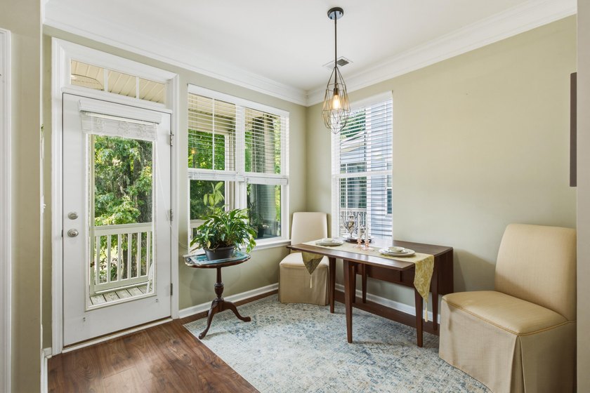 Welcome to this sophisticated and coveted end-unit townhome in - photo 14