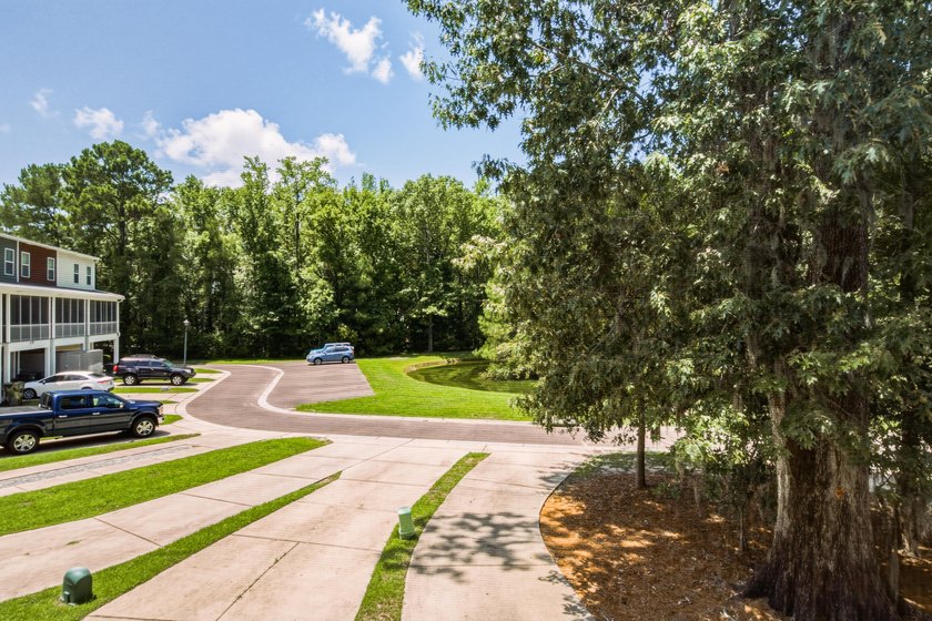 Welcome to this sophisticated and coveted end-unit townhome in - photo 19