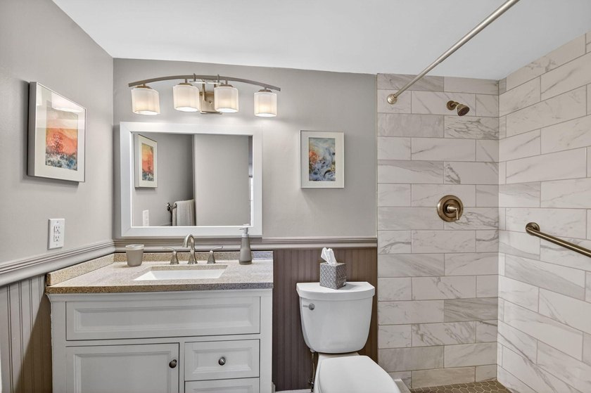 Experience sophisticated coastal living in this exquisitely - photo 29