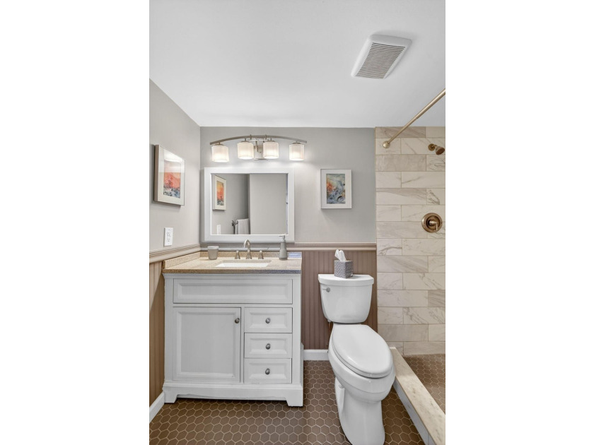 Experience sophisticated coastal living in this exquisitely - photo 30