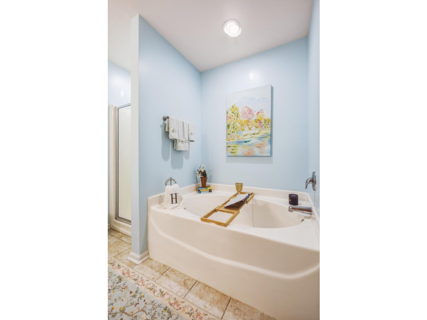 Welcome to this sophisticated and coveted end-unit townhome in - photo 31