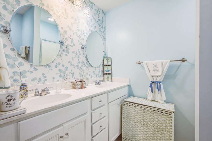 Welcome to this sophisticated and coveted end-unit townhome in - photo 32