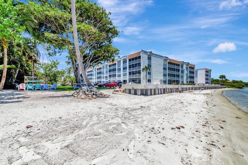 Experience sophisticated coastal living in this exquisitely - photo 41