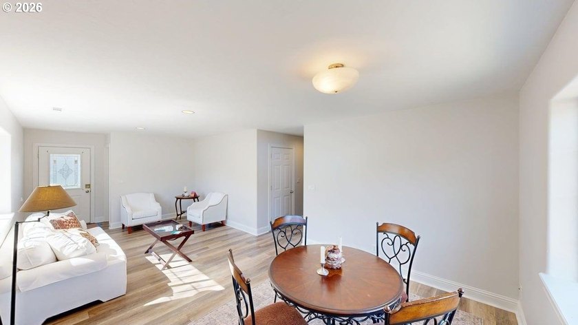 Three bedrooms and a spacious two-level layout set the tone for - photo 4