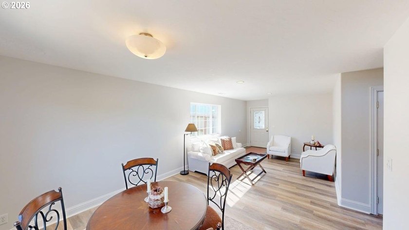 Three bedrooms and a spacious two-level layout set the tone for - photo 5