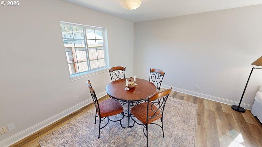 Three bedrooms and a spacious two-level layout set the tone for - photo 6
