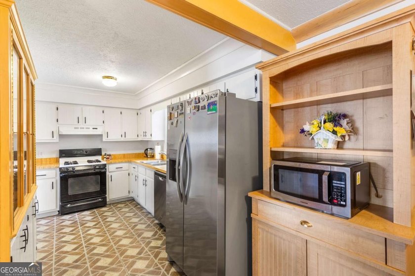 Opportunity awaits in highly desirable West Cobb with no HOA! - photo 9