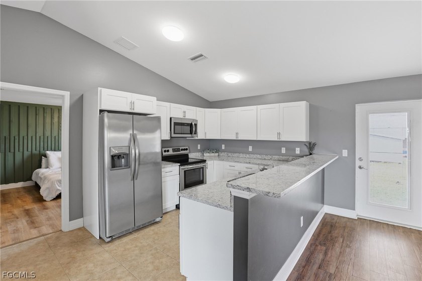 Move-in ready and packed with upgrades, this beautiful 3-bedroom - photo 3