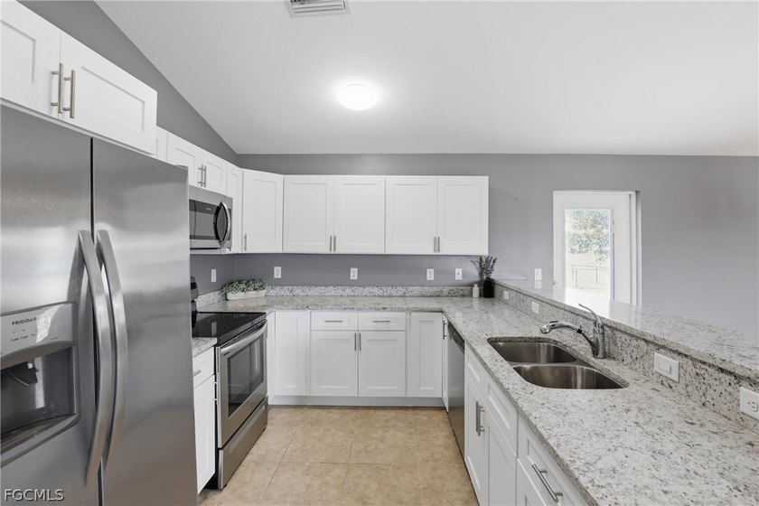 Move-in ready and packed with upgrades, this beautiful 3-bedroom - photo 4