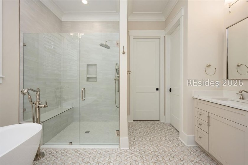 Completed in 2024, this beautifully designed 3-bedroom, 2-bath - photo 9