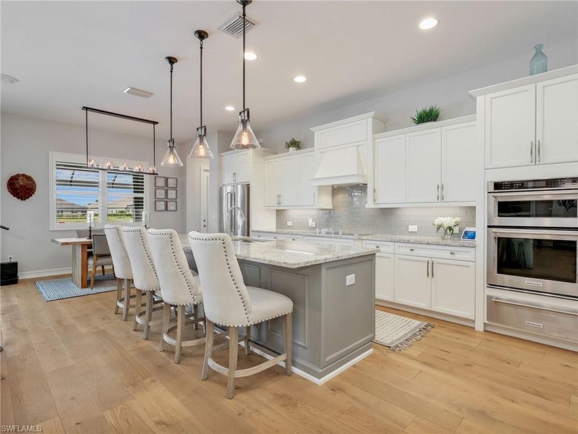 Move in ready and loaded with upgrades, this custom built Stock - photo 15