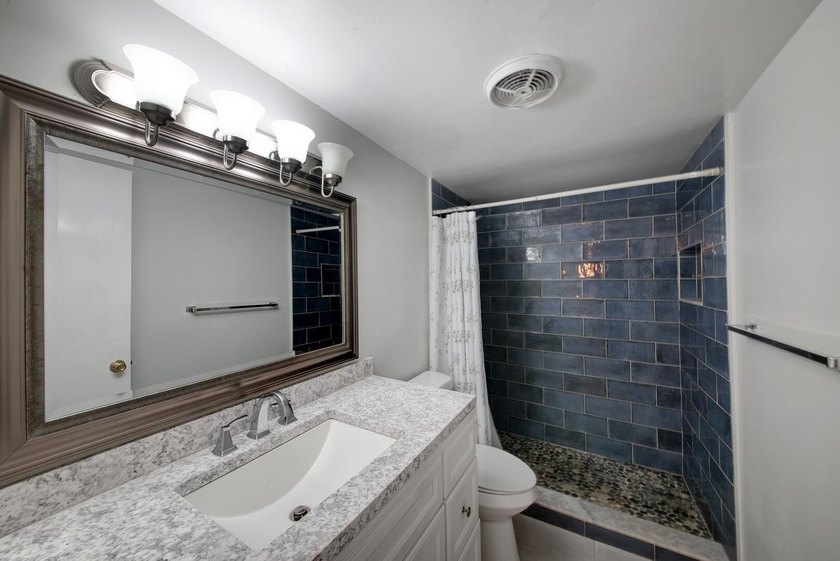 Beautifully updated 2-bedroom, 1-bathroom first-floor condo - photo 16