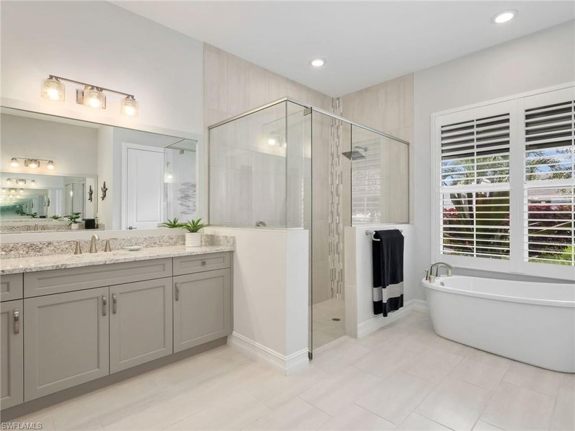 Move in ready and loaded with upgrades, this custom built Stock - photo 34