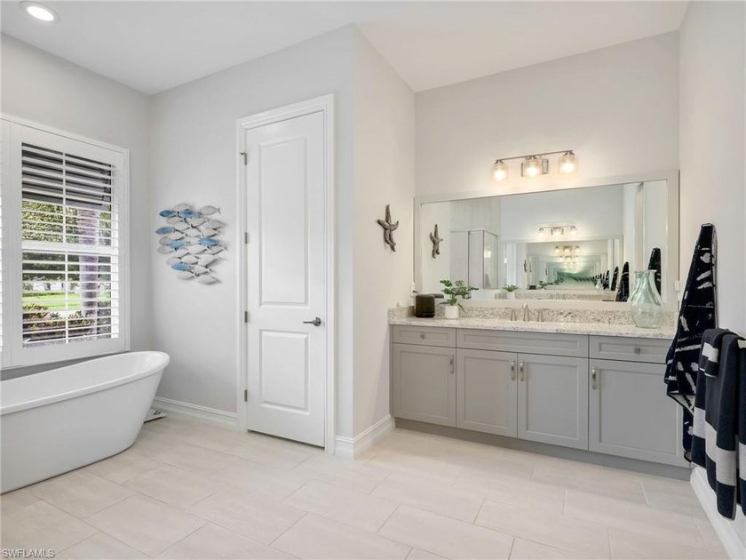 Move in ready and loaded with upgrades, this custom built Stock - photo 35