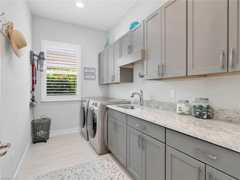 Move in ready and loaded with upgrades, this custom built Stock - photo 42