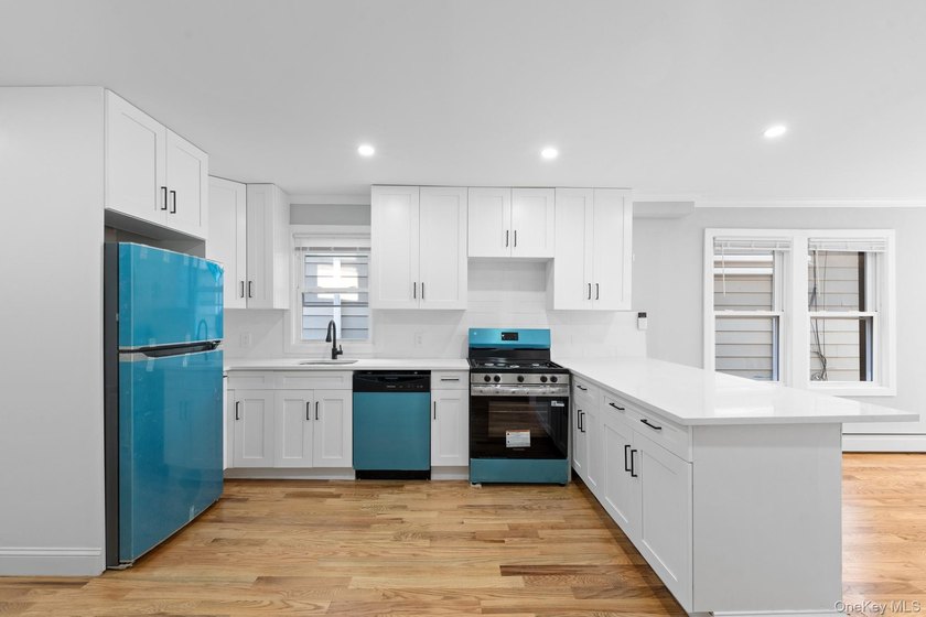 Welcome to 142-06-116th Avenue! A newly renovated, turn key - photo 3
