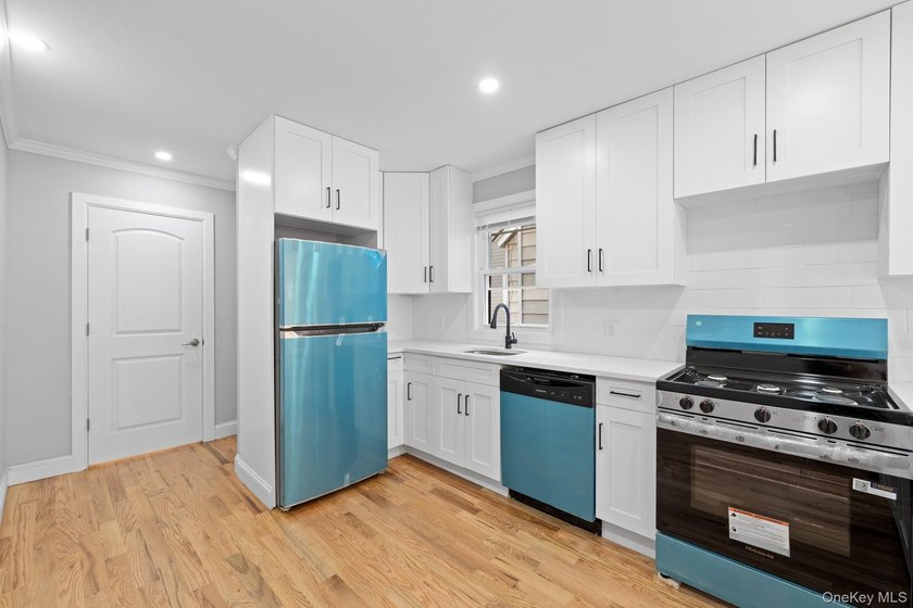 Welcome to 142-06-116th Avenue! A newly renovated, turn key - photo 4