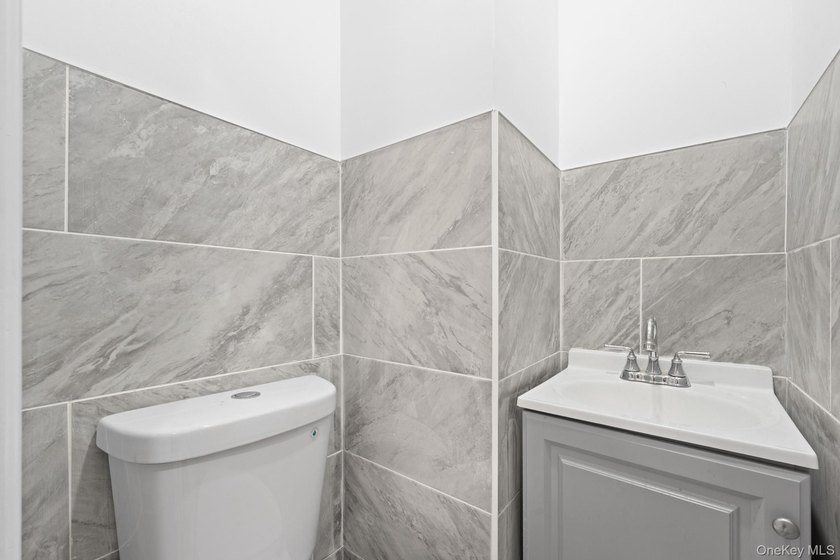 Welcome to 142-06-116th Avenue! A newly renovated, turn key - photo 5