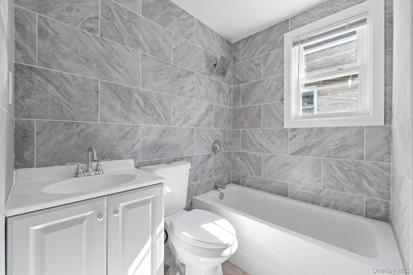 Welcome to 142-06-116th Avenue! A newly renovated, turn key - photo 9