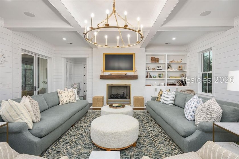 Gracefully positioned on a half-acre homesite overlooking one of - photo 5
