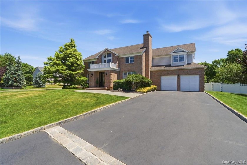 Welcome to 2 Mercedes Court, a beautifully maintained Colonial - photo 3