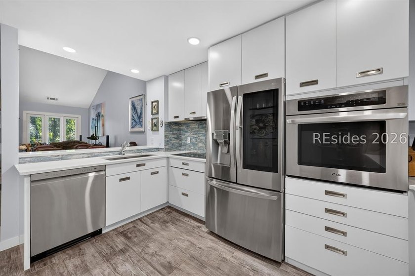Located in the desirable Windward Village enclave within the - photo 4