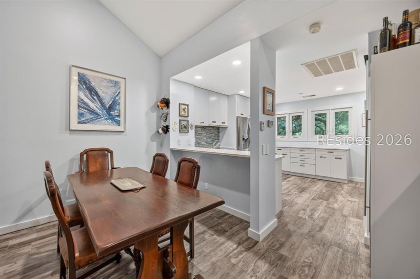 Located in the desirable Windward Village enclave within the - photo 5
