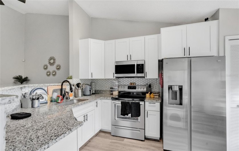 Welcome to 9616 River Walk Ct, a charming 2-bedroom, 2-bathroom - photo 3