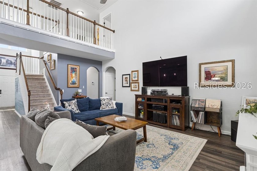 Welcome to this exceptional 4-bedroom, 2.5-bath home in the - photo 4