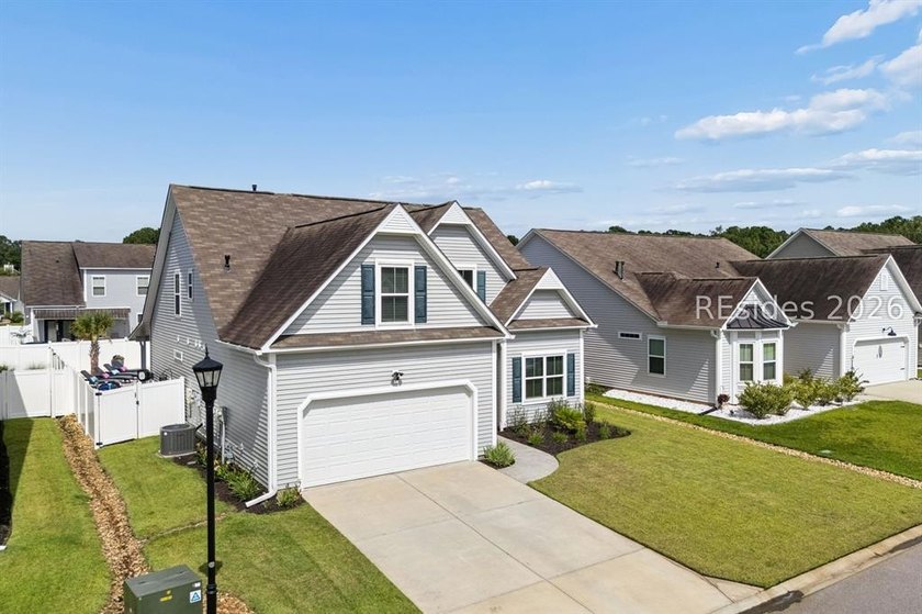 Welcome to this exceptional 4-bedroom, 2.5-bath home in the - photo 5