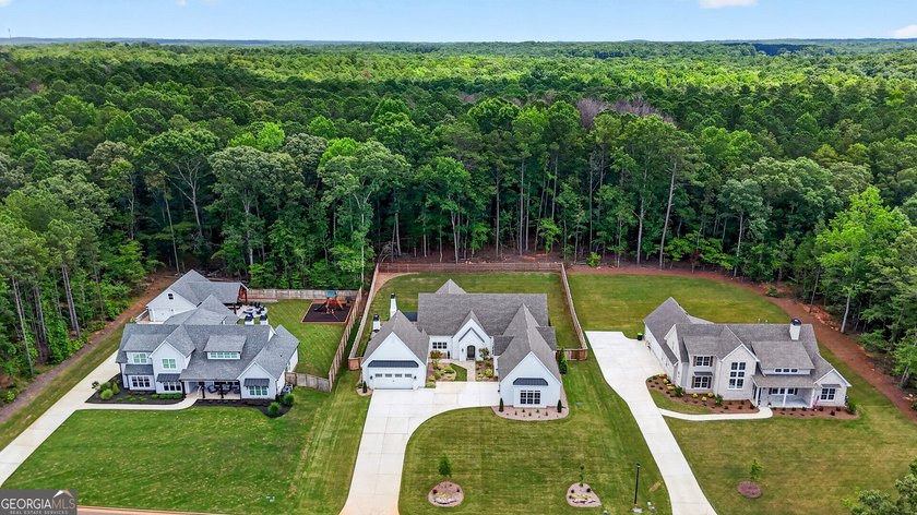EXPERIENCE EXCEPTIONAL CRAFTSMANSHIP AND LUXURY IN THIS STUNNING - photo 3