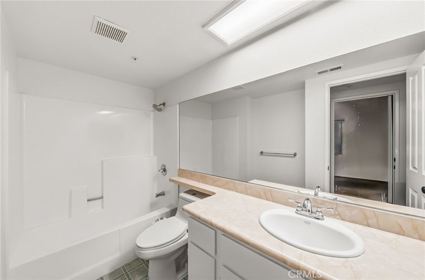 Perched in Signal Hill, this rare single-level 2-bed, 2-bath - photo 15