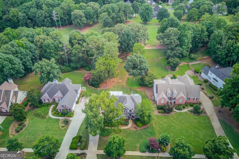 Nestled within the prestigious golf community of Providence Club - photo 3