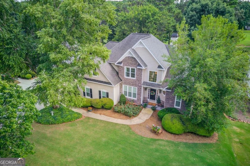 Nestled within the prestigious golf community of Providence Club - photo 8
