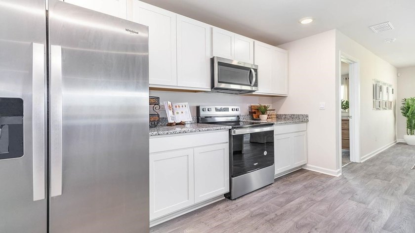This thoughtfully designed one level home is one of our most - photo 3