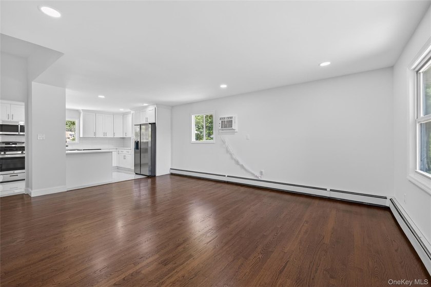 Welcome to this spacious renovated 5-bedroom, 2&amp; half-bathroom - photo 6