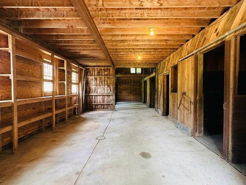 Welcome home to this stunning custom Ranch, featuring a barn - photo 36
