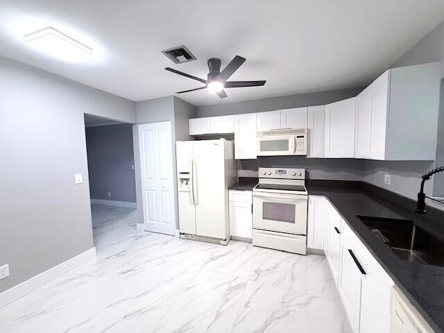 Ultra-modern remodel on this spacious end condo situated on the - photo 7
