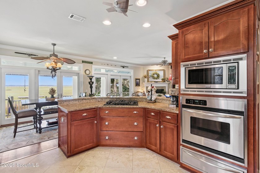 Your coastal oasis awaits! Exceptionally maintained custom-built - photo 13