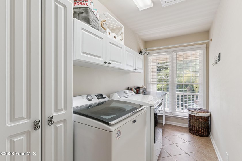Your coastal oasis awaits! Exceptionally maintained custom-built - photo 22
